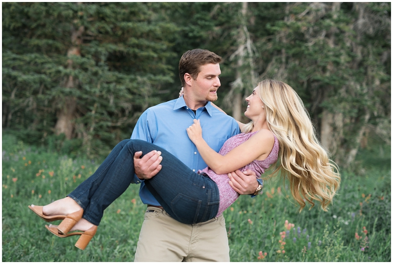 engagements, sunlight, mountains, wildflowers, mountain engagments, summer engagements, hair goals, engagement dresses, floral dress, grey suit, www.kristinacurtisphotography.com