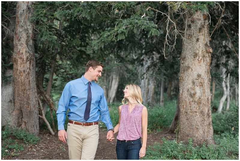 engagements, sunlight, mountains, wildflowers, mountain engagments, summer engagements, hair goals, engagement dresses, floral dress, grey suit, www.kristinacurtisphotography.com