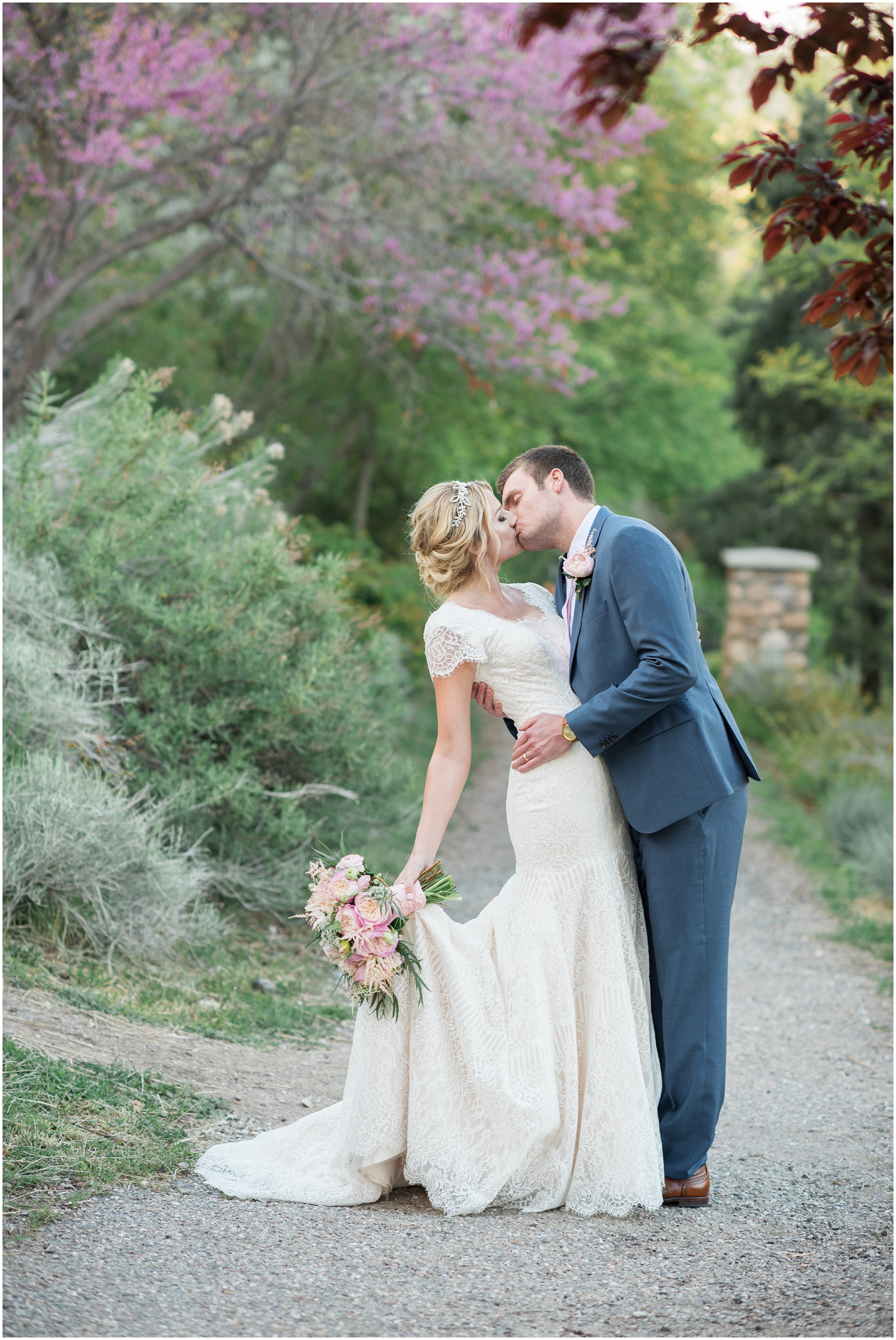 Spring wedding, ivy, lace wedding dress, blue suit, blush flowers, medium up do, outdoor wedding, blush tie, Utah wedding photographers, Utah wedding photographer, Utah wedding photography, Utah county wedding photography, Utah county wedding photographer, salt lake city photographers, salt lake city wedding photography, salt lake photographers, salt lake city photographers, photographers in Utah, Utah photography, photography Utah, photographer Utah, Kristina Curtis photography, Kristina Curtis Photographer, www.kristinacurtisphotography.com