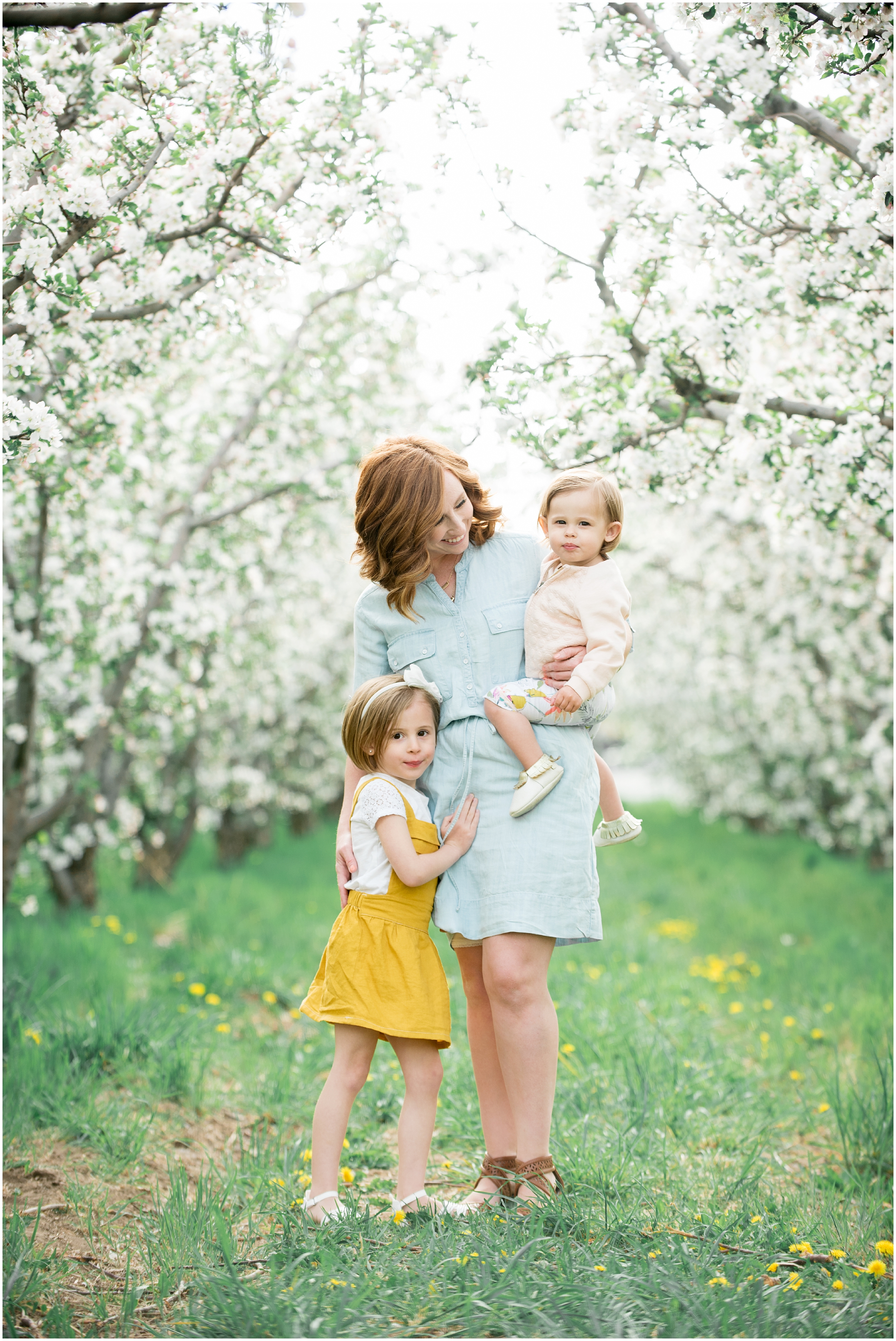 Family photographer, spring blossoms, play blue and yellow, orchard photos, Utah wedding photographers, Utah wedding photographer, Utah wedding photography, Utah county wedding photography, Utah county wedding photographer, salt lake city photographers, salt lake city wedding photography, salt lake photographers, salt lake city photographers, photographers in Utah, Utah photography, photography Utah, photographer Utah, Kristina Curtis photography, Kristina Curtis Photographer, www.kristinacurtisphotography.com