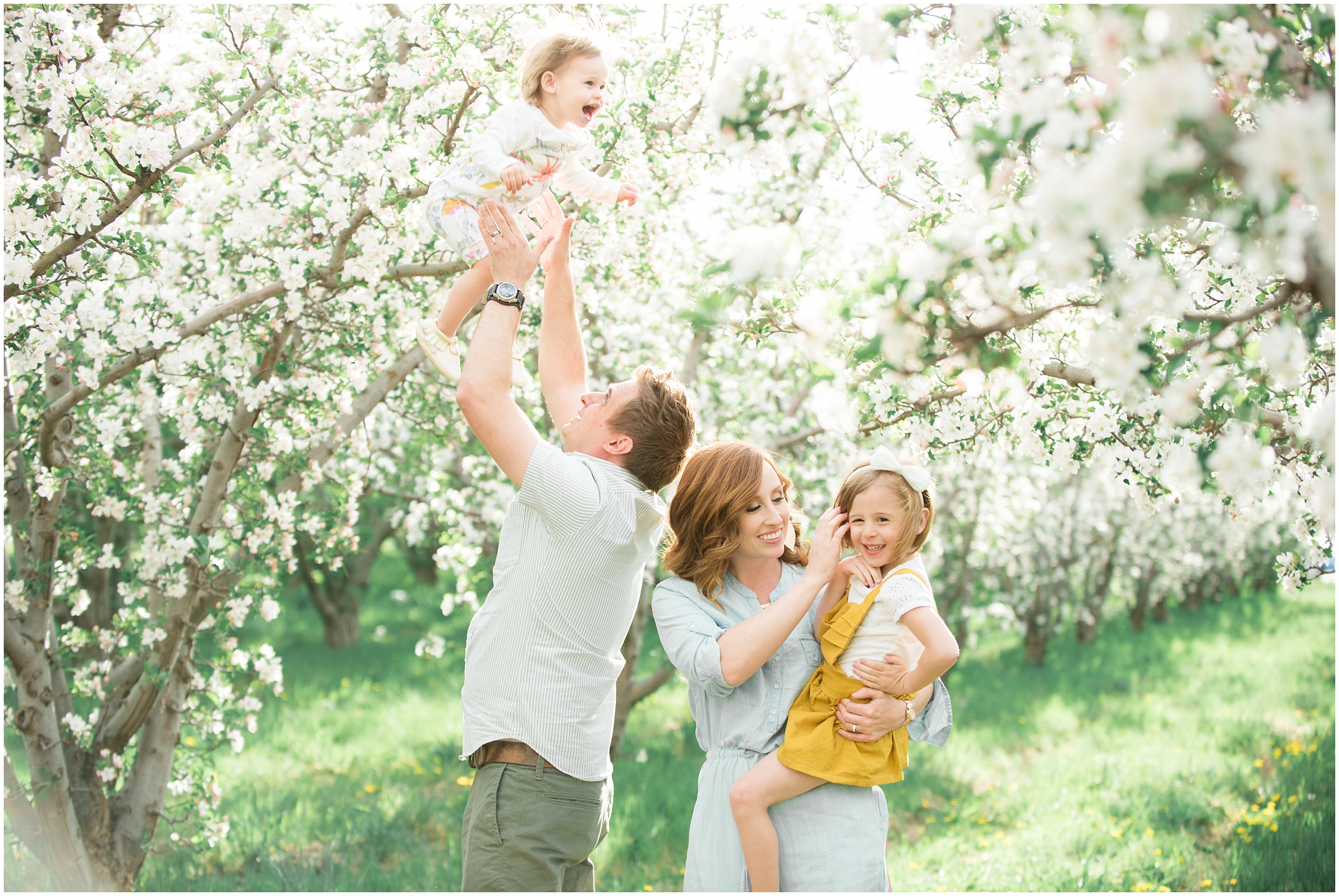 Family photographer, spring blossoms, play blue and yellow, orchard photos, Utah wedding photographers, Utah wedding photographer, Utah wedding photography, Utah county wedding photography, Utah county wedding photographer, salt lake city photographers, salt lake city wedding photography, salt lake photographers, salt lake city photographers, photographers in Utah, Utah photography, photography Utah, photographer Utah, Kristina Curtis photography, Kristina Curtis Photographer, www.kristinacurtisphotography.com