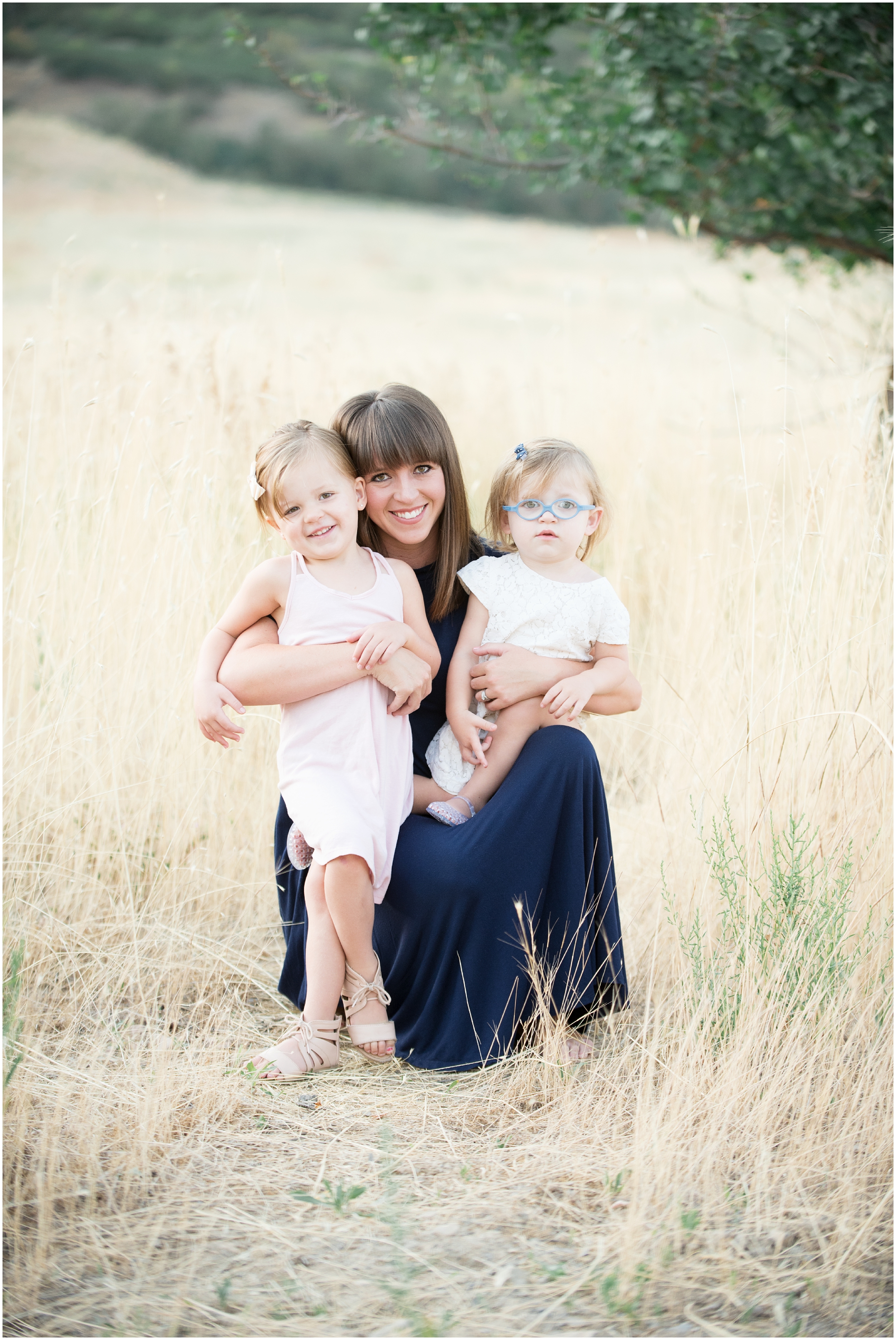 Wheat field family photos, outdoor family photos, Utah mountain family photos, navy and pink family photos, Newborn photography Utah, maternity photography Utah, Utah newborn photographer, Utah newborn photography, family photographers in Utah, Utah family photographer, family photos Utah, Kristina Curtis photography, Kristina Curtis Photographer, www.kristinacurtisphotography.com