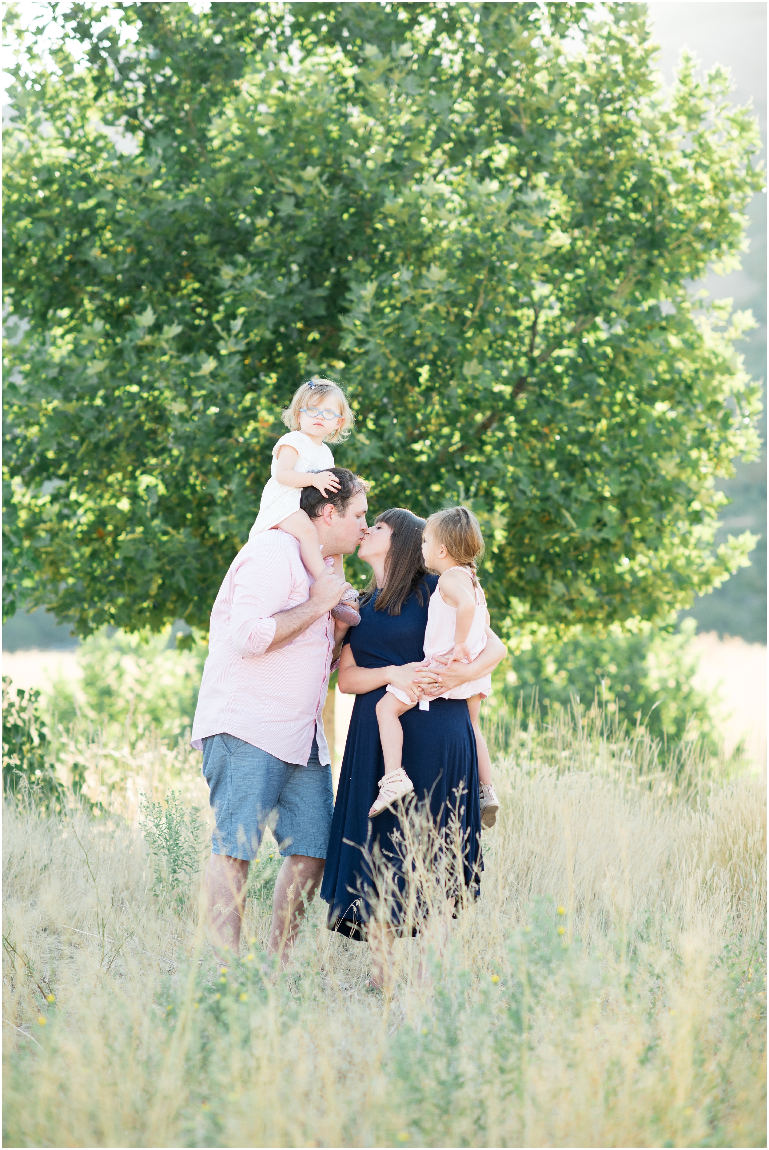 Wheat field family photos, outdoor family photos, Utah mountain family photos, navy and pink family photos, Newborn photography Utah, maternity photography Utah, Utah newborn photographer, Utah newborn photography, family photographers in Utah, Utah family photographer, family photos Utah, Kristina Curtis photography, Kristina Curtis Photographer, www.kristinacurtisphotography.com