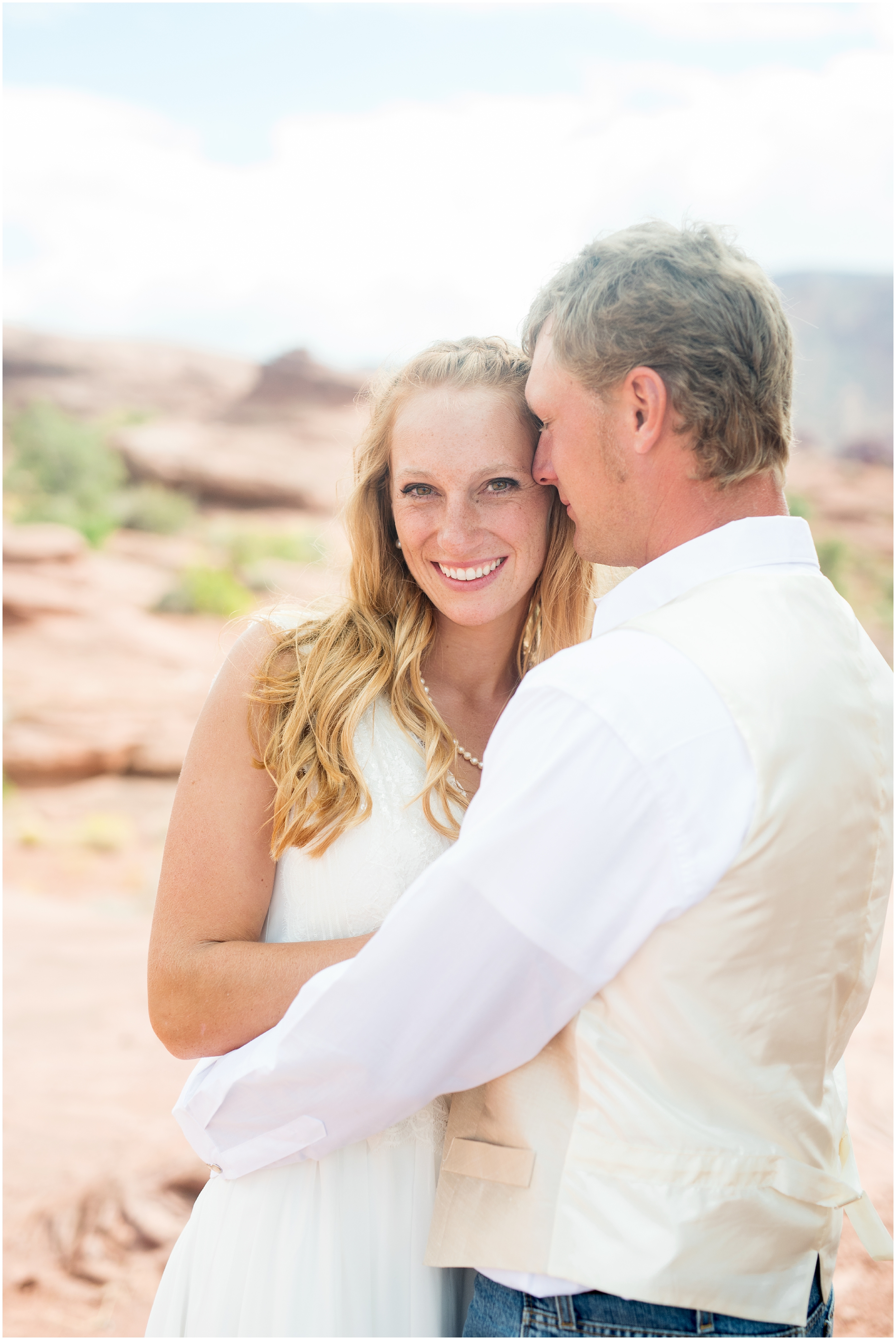 Destination wedding, southern Utah wedding, red rocks wedding, desert wedding, country wedding, cowboy wedding, summer wedding, sunflower wedding flowers, cowboy boots wedding , Utah wedding photographers, Utah wedding photographer, Utah wedding photography, Utah county wedding photography, Utah county wedding photographer, salt lake city photographers, salt lake city wedding photography, salt lake photographers, salt lake city photographers, photographers in Utah, Utah photography, photography Utah, photographer Utah, Kristina Curtis photography, Kristina Curtis Photographer, www.kristinacurtisphotography.com