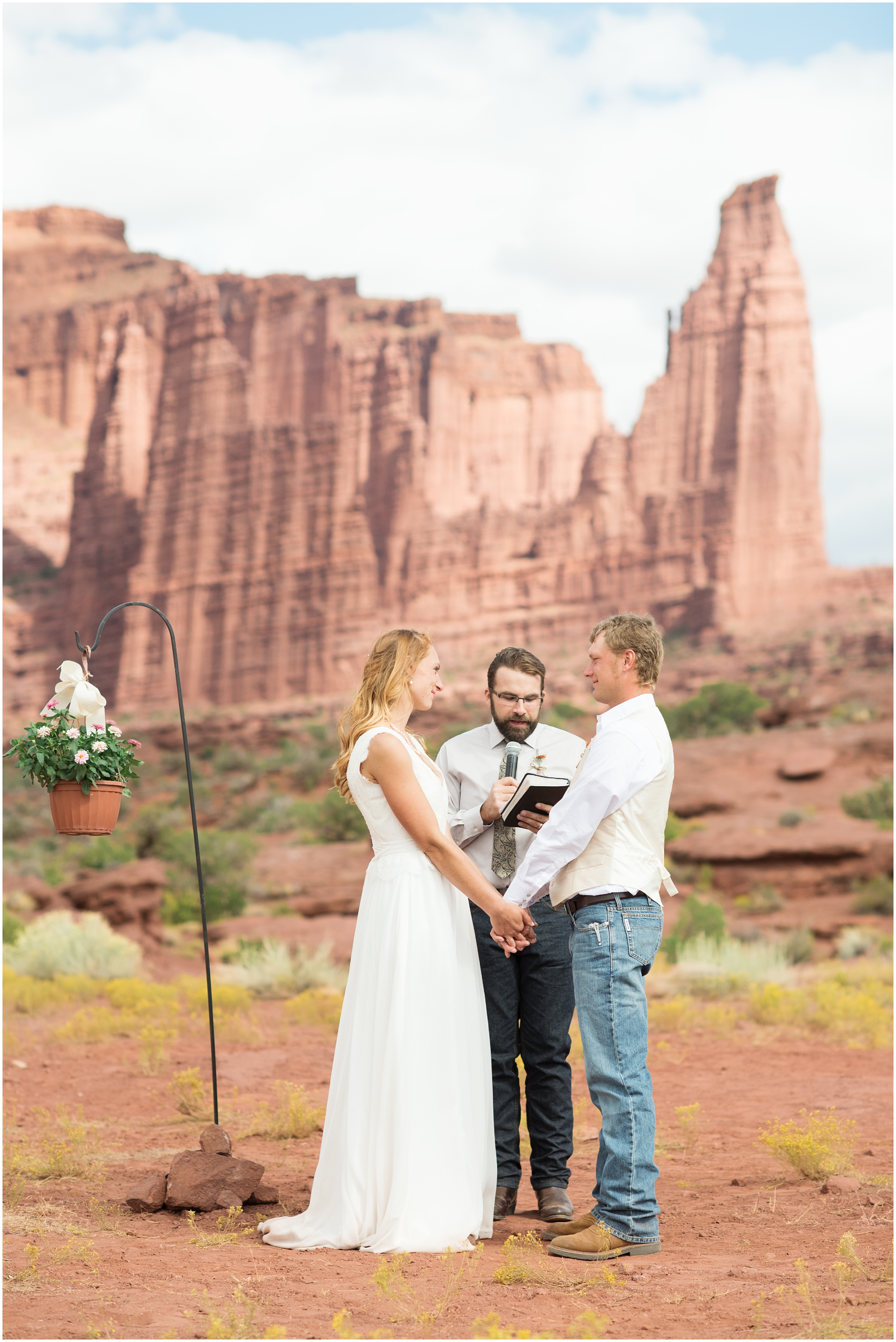 Destination wedding, southern Utah wedding, red rocks wedding, desert wedding, country wedding, cowboy wedding, summer wedding, sunflower wedding flowers, cowboy boots wedding , Utah wedding photographers, Utah wedding photographer, Utah wedding photography, Utah county wedding photography, Utah county wedding photographer, salt lake city photographers, salt lake city wedding photography, salt lake photographers, salt lake city photographers, photographers in Utah, Utah photography, photography Utah, photographer Utah, Kristina Curtis photography, Kristina Curtis Photographer, www.kristinacurtisphotography.com