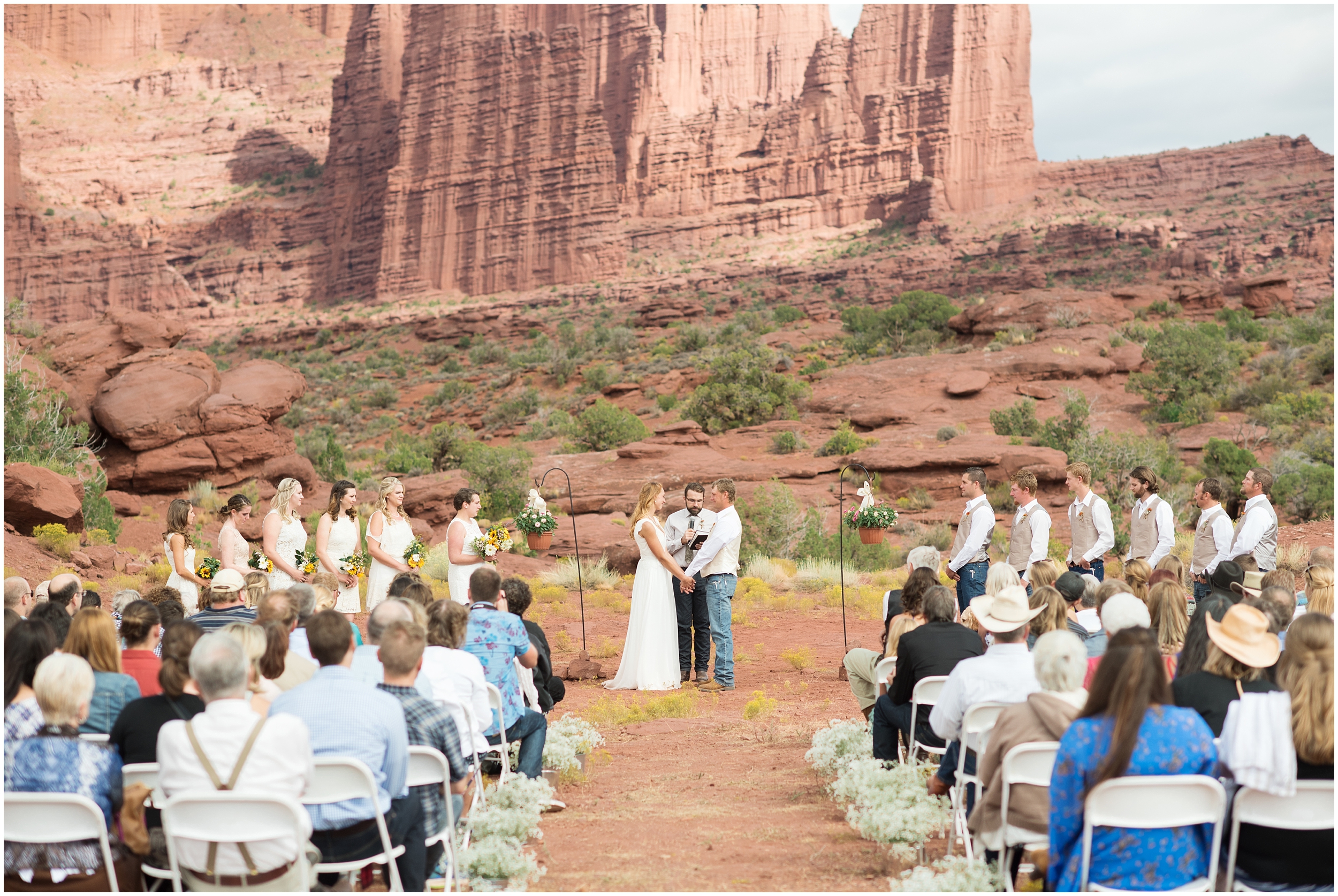 Destination wedding, southern Utah wedding, red rocks wedding, desert wedding, country wedding, cowboy wedding, summer wedding, sunflower wedding flowers, cowboy boots wedding , Utah wedding photographers, Utah wedding photographer, Utah wedding photography, Utah county wedding photography, Utah county wedding photographer, salt lake city photographers, salt lake city wedding photography, salt lake photographers, salt lake city photographers, photographers in Utah, Utah photography, photography Utah, photographer Utah, Kristina Curtis photography, Kristina Curtis Photographer, www.kristinacurtisphotography.com