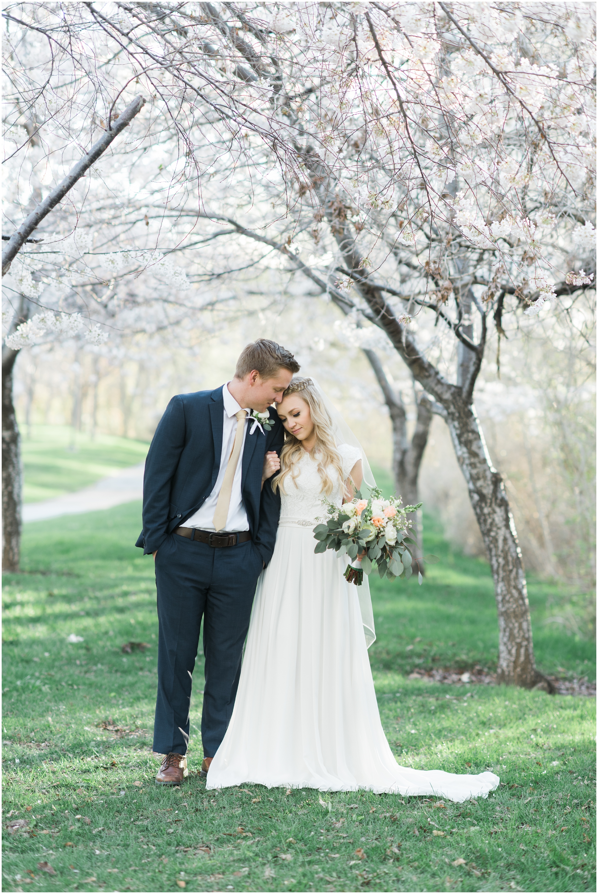 Kristina Curtis, blush flowers, spring blossoms photos, spring engagements, outdoor engagements, long veil, blush and navy wedding, spring outdoor engagements, photographers in Utah, Utah family photographer, family photos Utah, Kristina Curtis photography, Kristina Curtis Photographer, www.kristinacurtisphotography.com