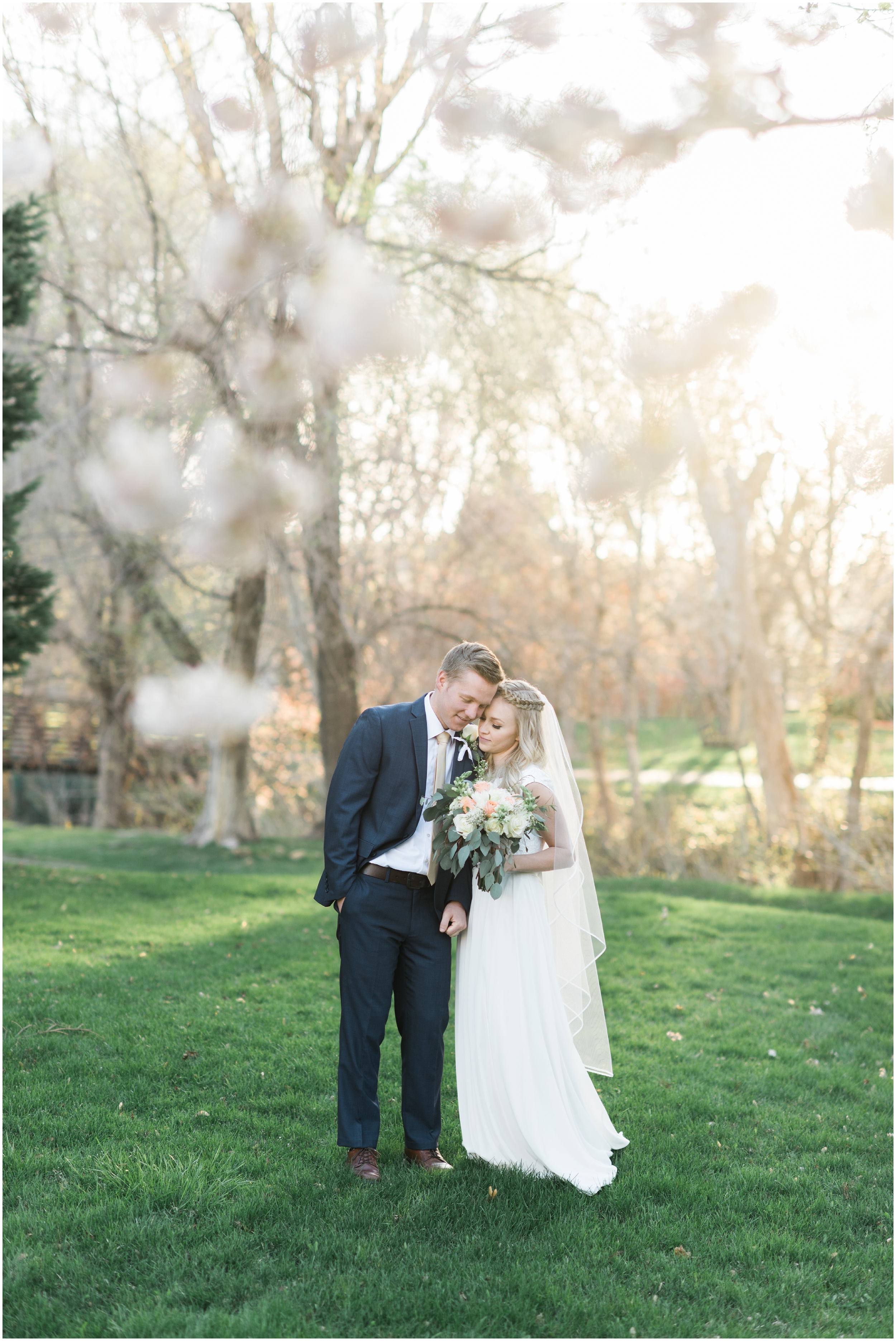 Kristina Curtis, blush flowers, spring blossoms photos, spring engagements, outdoor engagements, long veil, blush and navy wedding, spring outdoor engagements, photographers in Utah, Utah family photographer, family photos Utah, Kristina Curtis photography, Kristina Curtis Photographer, www.kristinacurtisphotography.com