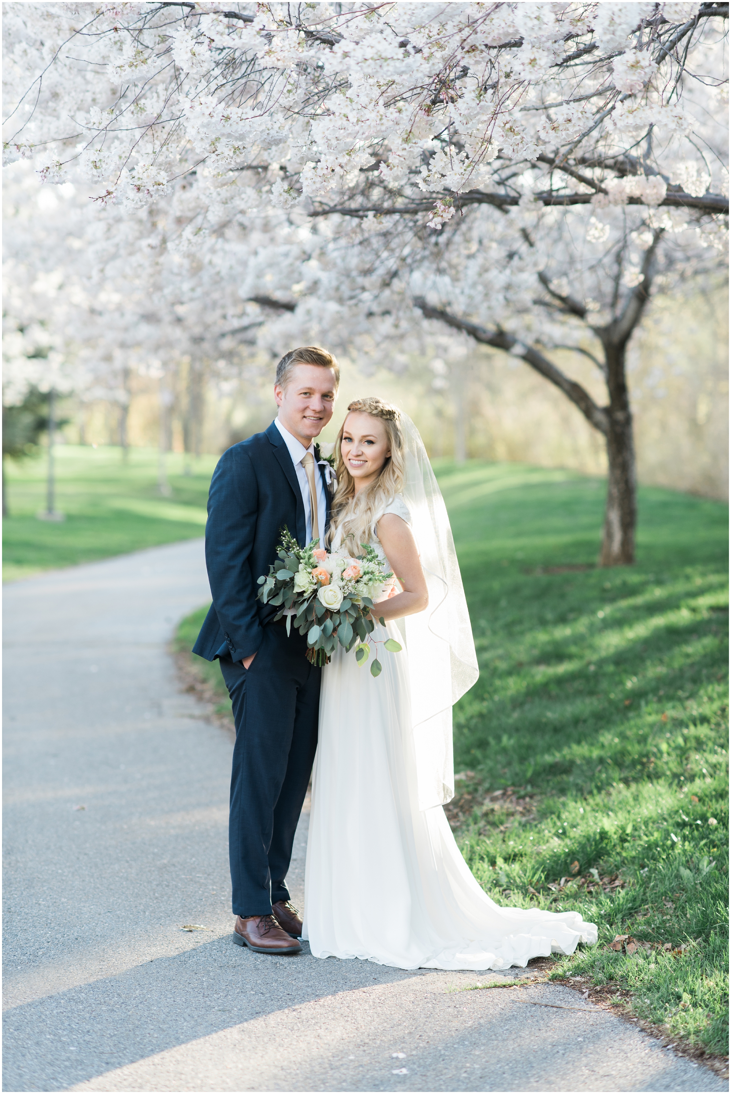 Kristina Curtis, blush flowers, spring blossoms photos, spring engagements, outdoor engagements, long veil, blush and navy wedding, spring outdoor engagements, photographers in Utah, Utah family photographer, family photos Utah, Kristina Curtis photography, Kristina Curtis Photographer, www.kristinacurtisphotography.com